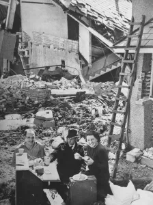 Residents of a bombed out house at Oreston Plymouth have a break from salvaging