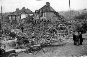 War And Prints: Residents of a bombed-out road in Henleaze recover clothing