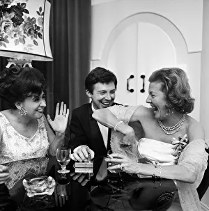01121 Prints: Two residents of Coronation Street'share a joke with royalty at a party in