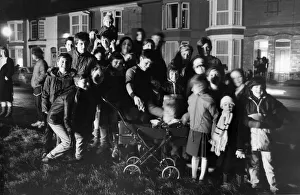 Bonfire Night Prints: Residents of Hornby Boulevard, Bootle gather to watch a private bonfire