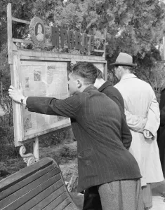 Russia Prints: Residents read the official soviet newspaper Pravda from a public noticeboard in a