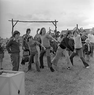 The residents of the West End of Newcastle playing old English games at the Denton Burn