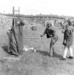 00353 Prints: The residents of the West End of Newcastle playing old English games at the Denton Burn