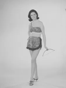 Reveille Fashion Feature Reveille Model Gloria Janes seen here modelling red