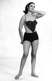 Reveille Fashion: Have a heart. The heart-shaped top reveals a bare back