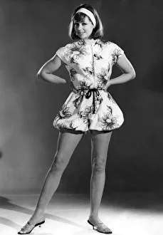 Reveille fashions 1962: Annie Alliston wearing a floral print beach wear outfit