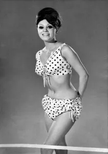Reveille Fashions 1964: Carmen Dine modeling a polka dot bikini. June 1964 P007548