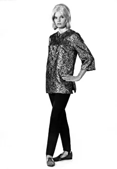 00056 Prints: Reveille Fashions 1964: Dianna Terry modeling a silk over blouse with black slacks
