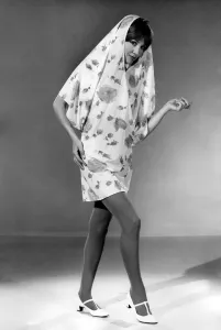 Reveille Fashions 1966: Anne Powell modelling summer dress come shower coat