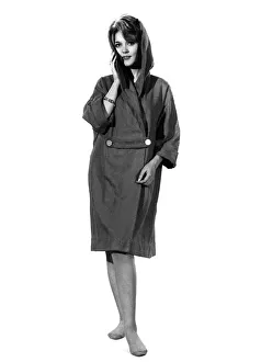 00049 Prints: Reveille Fashions: Delia Freeman modelling coat and matching scarf. January 1966 P006670