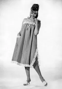 00056 Prints: Reveille Fashions: Jo Waring. wearing a three quarters length night dress