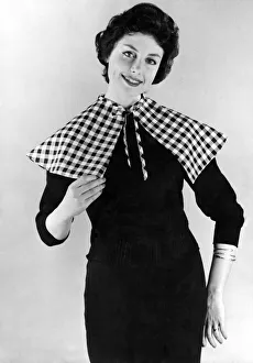 Reveille Fashions. Mannequinn modelling ginham collar and scarf. April 1959 P006952