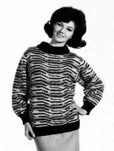 Reveille Fashions: Meriel Weston wearing striped jumper. October 1964 P006756