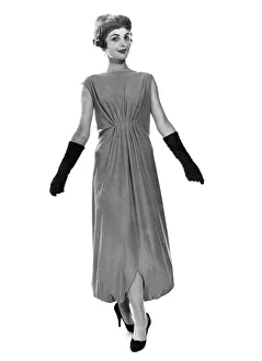 00053 Prints: Reveille Fashions. Model wearing a evening dress and hair band by Best foot forward line