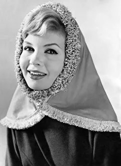 Reveille Fashions. Model wearing a head scarf February 1959 P006922