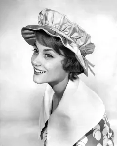 Reveille Fashions. Modell wearing summer hat April 1959 P006942