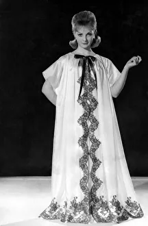 00053 Prints: Reveille Fashions: Roma Reeves modelling full length night dress. May 1960 P006995