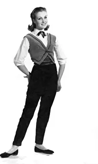 00053 Prints: Reveille Fashions: Roma Reeves modelling slacks and a tailored waistcoat