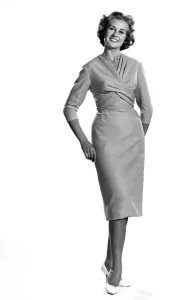 00053 Prints: Reveille Fashions. Rosemary Stewart modelling cocktail dress. November 1959 P006977