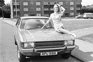 Reveille model Andrea Lloyd seen here posing with a Ford Consul which is top prize in