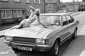 Reveille model Andrea Lloyd seen here posing with a Ford Consul which is top prize in