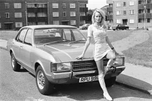 Reveille model Andrea Lloyd seen here posing with a Ford Consul which is top prize in