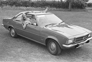 Reveille model Angela Jay seen here posing with a Opel Kadett car first prize in a