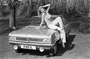 Reveille model Lia seen here posing with a Vauxhall Viva car which is a top prize in