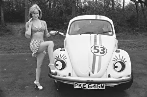 Reveille model Malou Cartwright seen here posing with a Volkswagen Beetle in the guise of