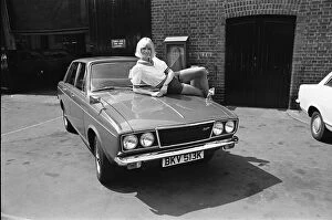 Images Dated 19th October 2010: Reveille model Nancy Lee seen here posing with a Hillman Sunbeam which is top prize in