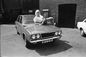 Single Woman Prints: Reveille model Nancy Lee seen here posing with a Hillman Sunbeam which is top prize in