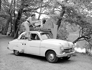 Two reveille models seen here demonstrating the new car rack tent