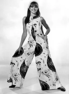 Reveille Patterns. Joanne Young wears an all in one trouser suit