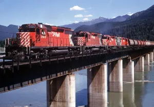 00133 Prints: Revelstoke British Columbia Canada Freight train pulled by four diesel engines