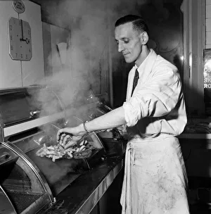 Serving Prints: The Reverend Clifford L. Tillett removes his clerical collar every evening