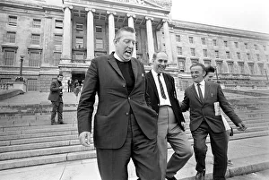 The Reverend Ian Paisley and Major Ronald Bunting leave the Stormont building in Belfast