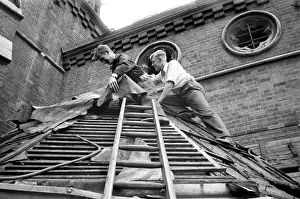 Reverend Vivian Symons helps to demolish All Saints church in Peckham for Re-Erection