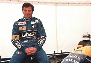 Images Dated 1st July 1991: RICARDO PATRESE, MOTOR RACING DRIVER, AT SILVERSTONE SITTING BESIDE CAR WEARING RACING