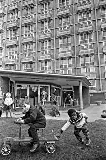 Nursery Prints: Richard Bailey seen here giving his friend a push during break time at the St Mary