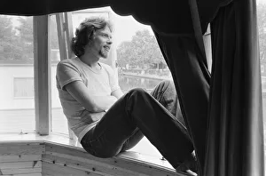 00987 Prints: Richard Branson, 28 year old mastermind behind Virgin Music company. Relaxing on his boat