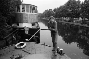 01268 Prints: Richard Branson aboard his houseboat / office at Maida Vale, London. 31st July 1982