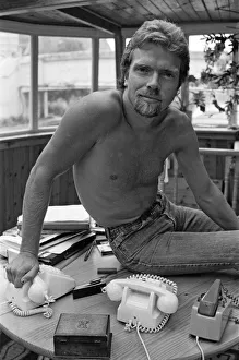 01268 Prints: Richard Branson aboard his houseboat / office at Maida Vale, London. 31st July 1982