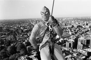 Businessman Prints: Richard Branson dressed as spiderman leaves the top of Centre Point. 2nd November 1985