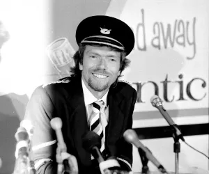 Richard Branson at a press conference before the inaugural flight of his Virgin Atlantic