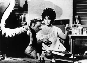 00144 Prints: Richard Burton Actor with actress Liz Taylor in the film Divorce His