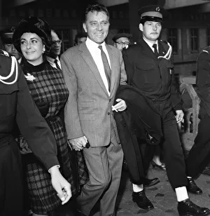Mature Couple Prints: Richard Burton and Elizabeth Taylor after disembarking from The Queen Elizabeth