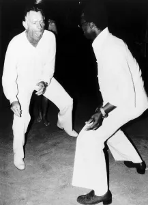 00292 Prints: Richard Burton on the floor in Tshipisei at a birhday party in Oct 1977