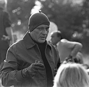 Richard Burton between takes during location filming of The Villain