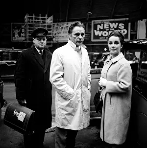 Richard Burton and wife Elizabeth Taylor at Paddington Station in London