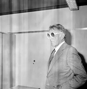 00292 Prints: Richard Burton and his wife Susie leaving Heathrow for their home in Geneva